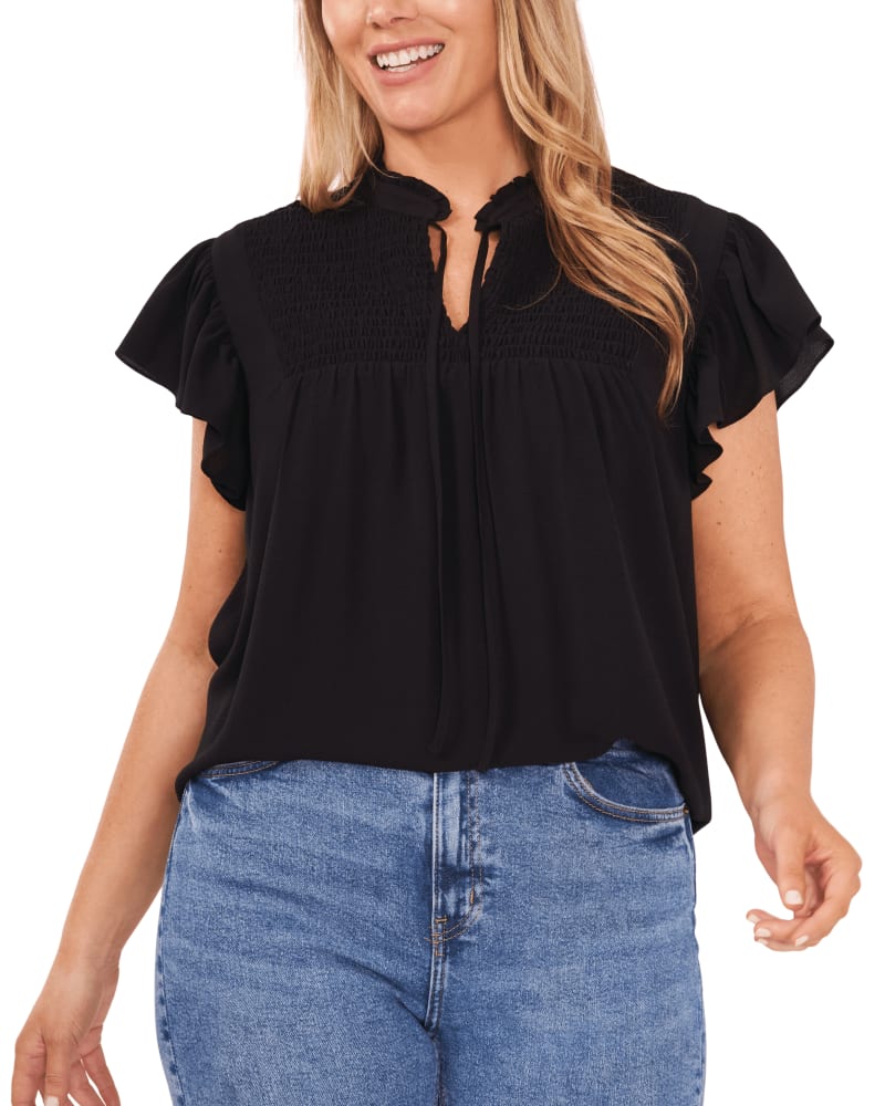 Front of a model wearing a size 1X Gia Flutter Sleeve Top in RICH BLACK by CeCe. | dia_product_style_image_id:263741